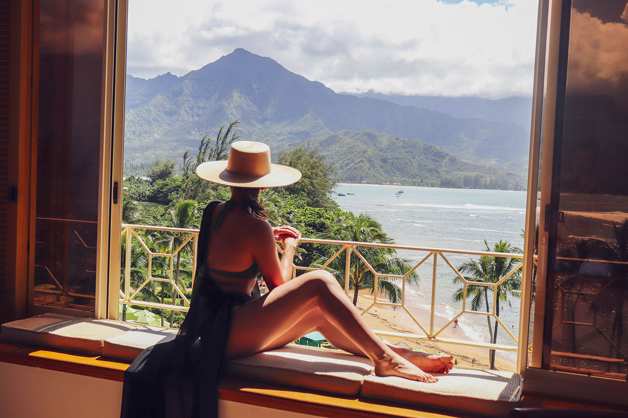 Girl-looking-out-window-kauai-views