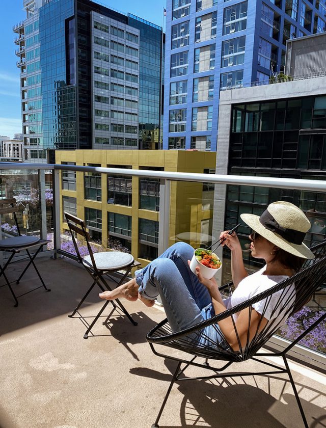 eating a poke in a balcony San Diego